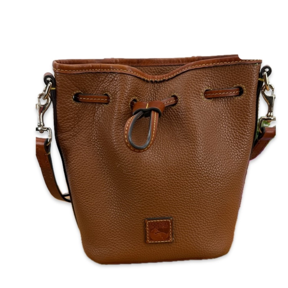 Dooney & Bourke Pebble Grain Small Drawstring bag in the color caramel.